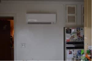A ductless split air conditioner installed in a kitchen in CT.